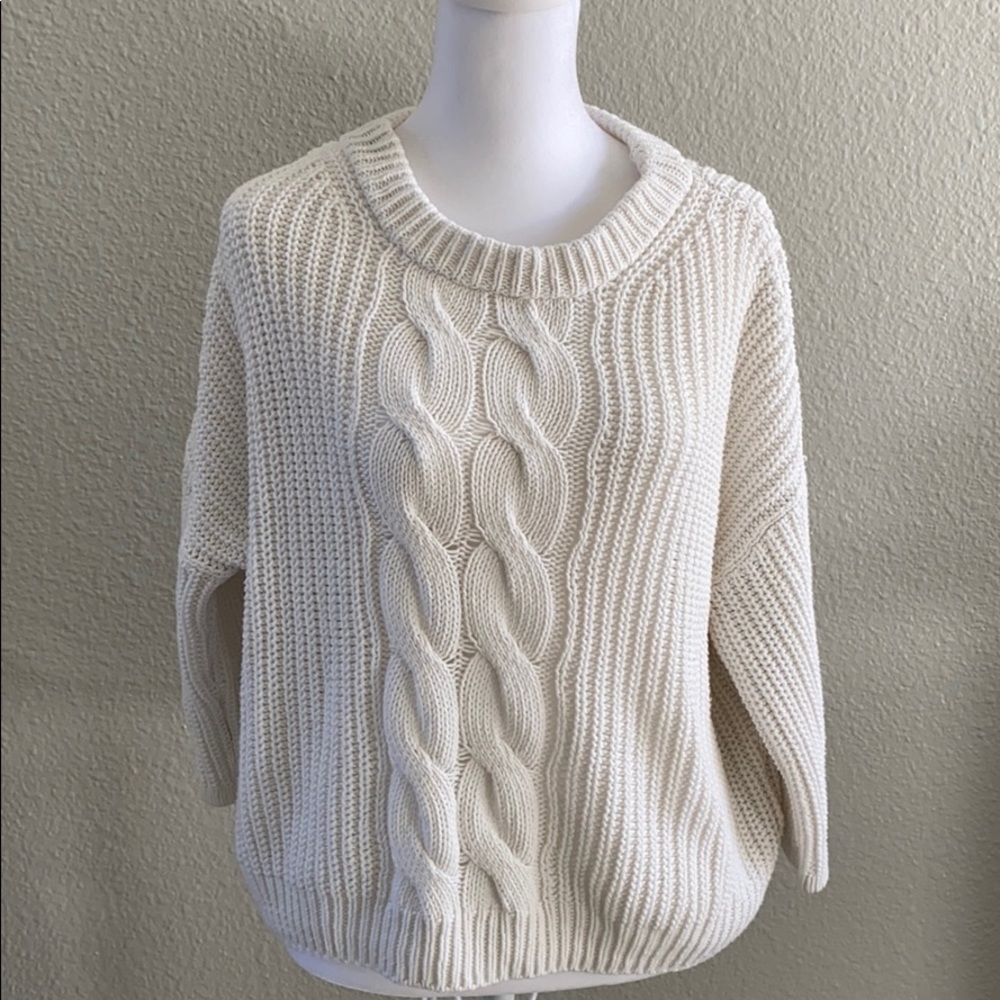 Knitted white sweater